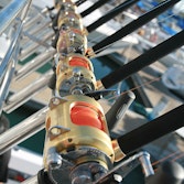Close up of fishing rod handles lined up as part of qualia fishing charter tour