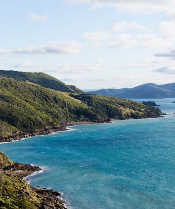 Aerial view of stunning blue water and Hamilton Island Golf Club