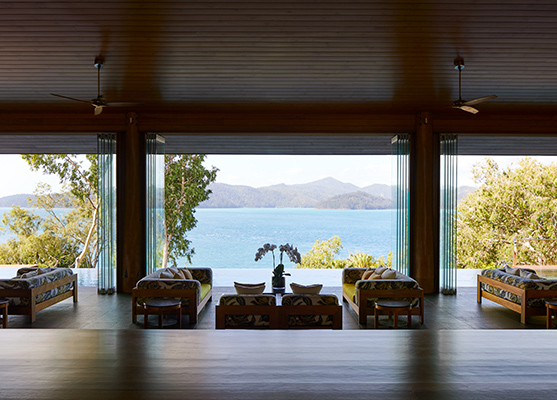 Entrance to qualia resort Long Pavilion restaurant with lounge area and Whitsundays views