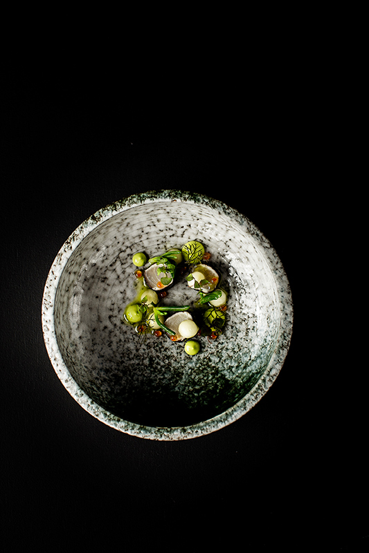 Whitsunday sunset view from dinner tables set outdoor at qualia resort's Long Pavilion restaurant