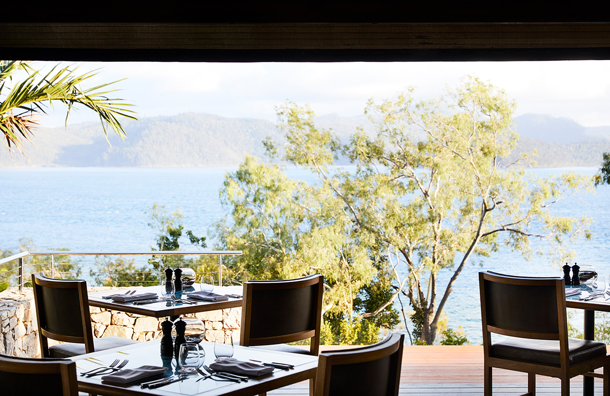 Whitsundays views of breakfast tables set at qualia resort's Long Pavilion restaurant