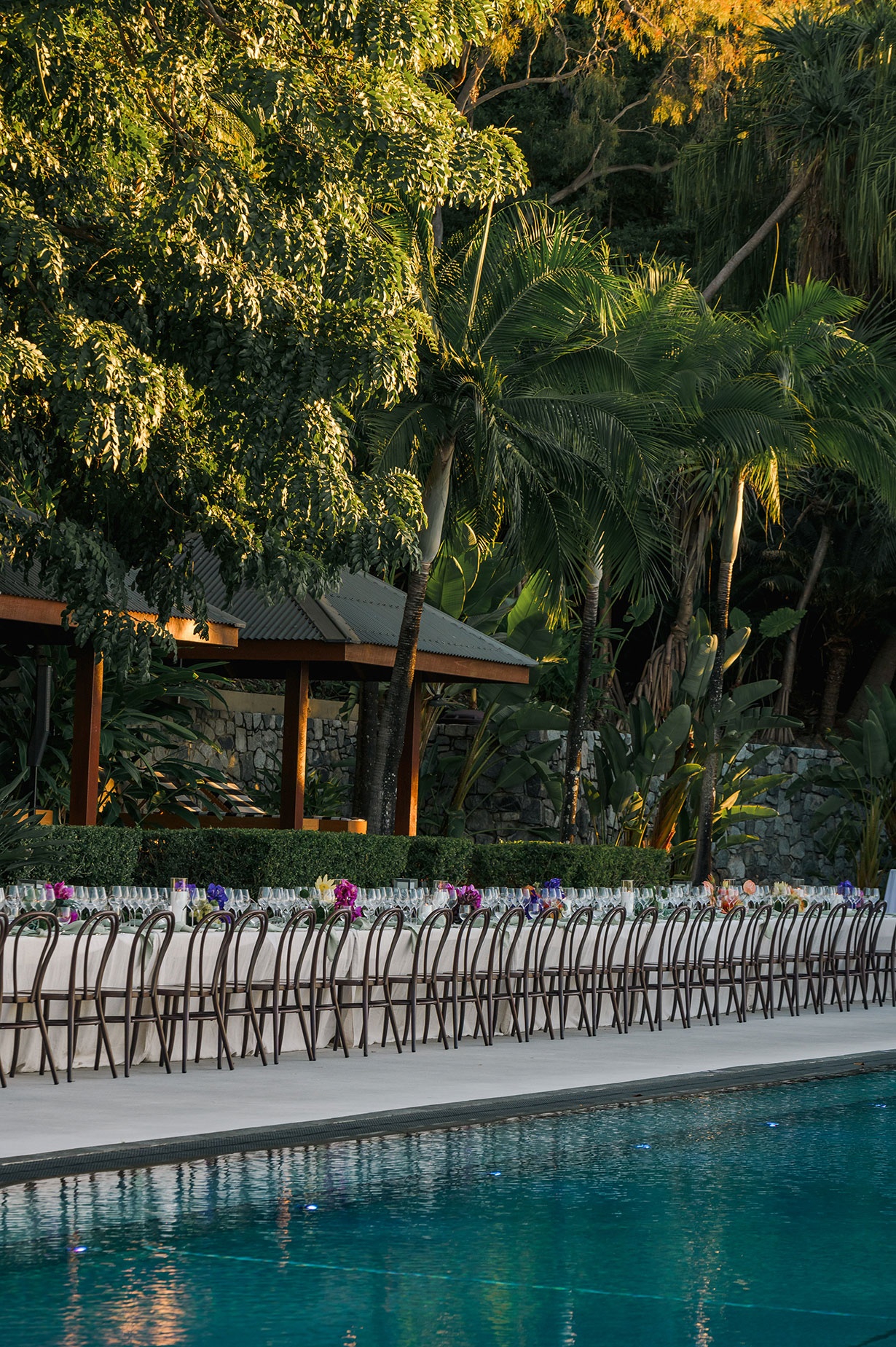 Sailing fleet passage in the turquoise waters of the Whitsundays at Hamilton Island Race Week 