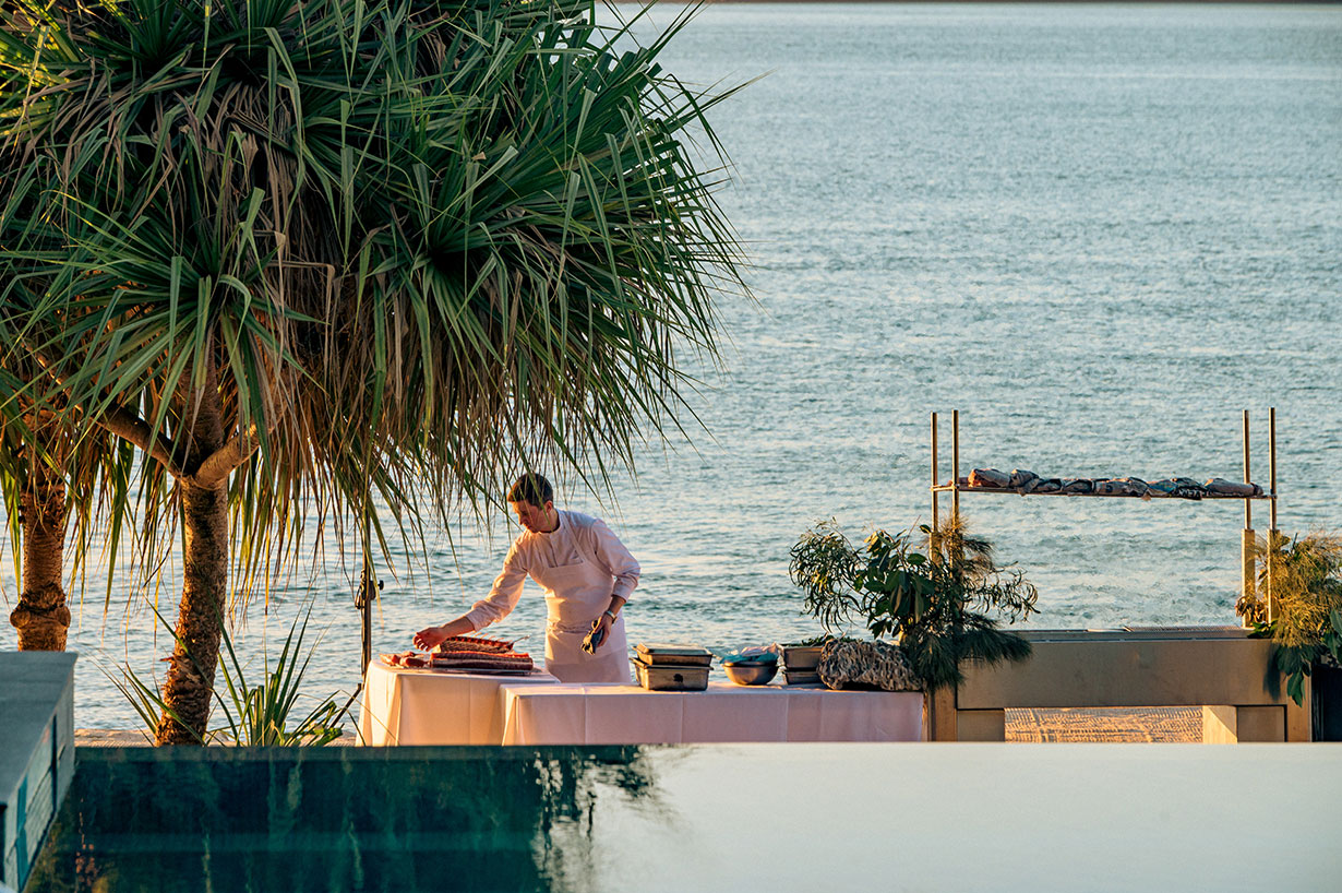 Sailing fleet passage in the turquoise waters of the Whitsundays at Hamilton Island Race Week 