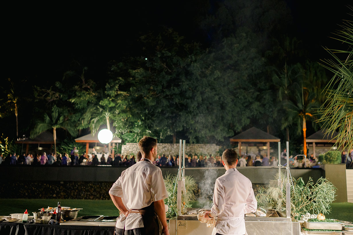Sailing fleet passage in the turquoise waters of the Whitsundays at Hamilton Island Race Week 