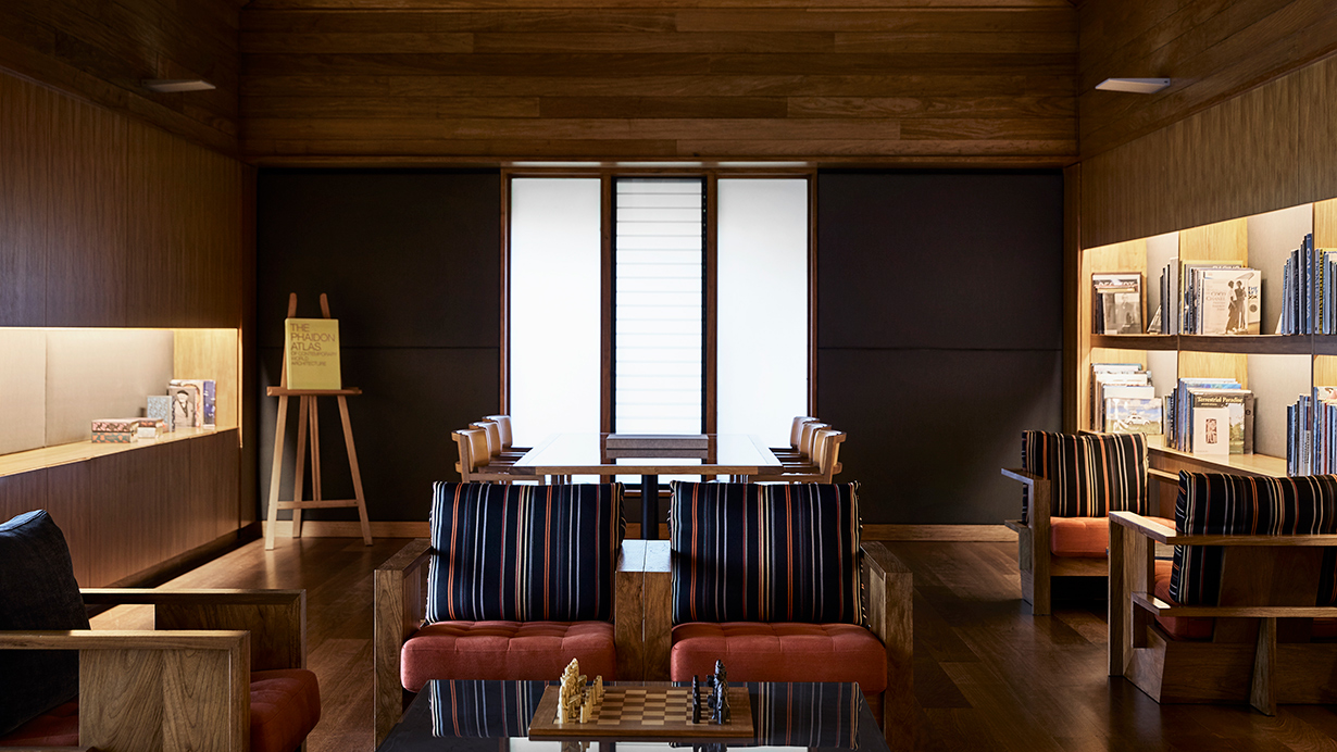 exterior view of qualia resort and surrounding trees from the calm waters of the Whitsundays 