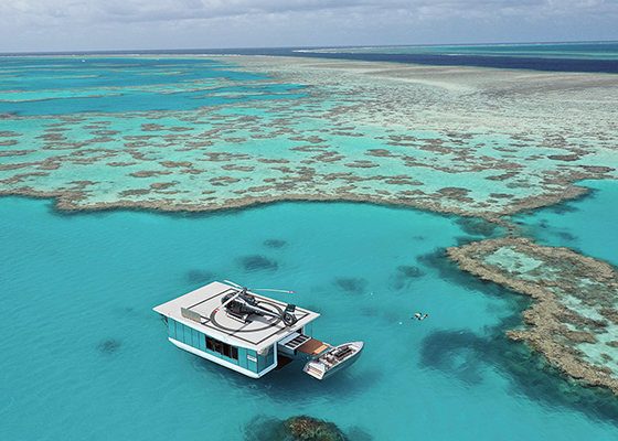 qualia experience of Journey to the Heart featuring luxury pontoon near Heart Island in Great Barrier Reef
