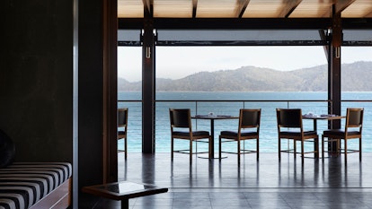 qualia Pebble Beach Restaurant Tables Set For Lunch With Whitsundays Views